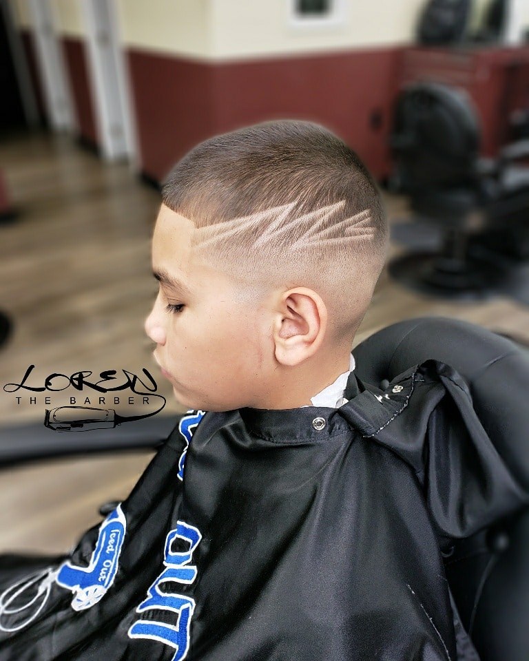 Kids haircut with custom lightning design on the side